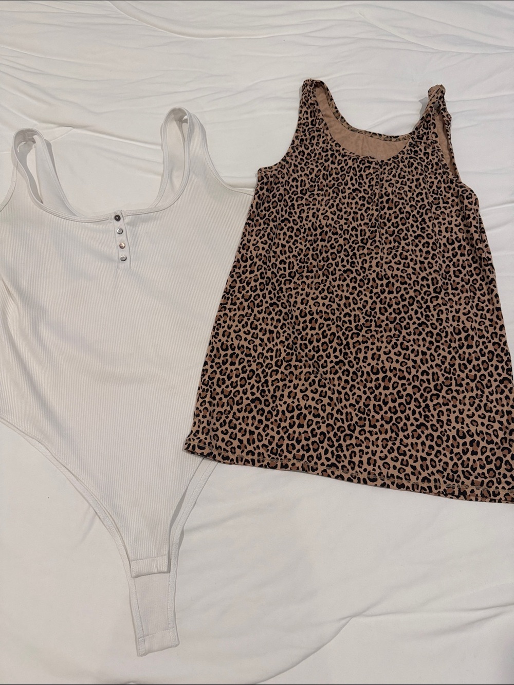 Two Tank Tops. White Tank bodysuit and Cheetah Print